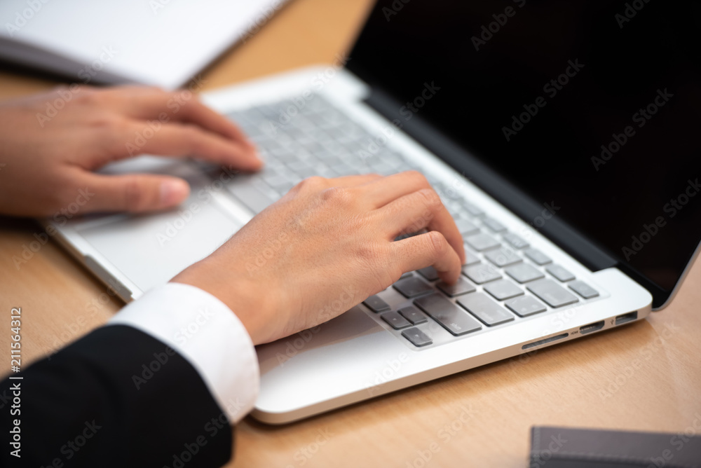 Close up of female hands typing on laptop computer keyboard. Close up of female hands typing on laptop computer keyboard.