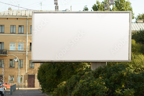 billboard white on the street in the city. for advertising