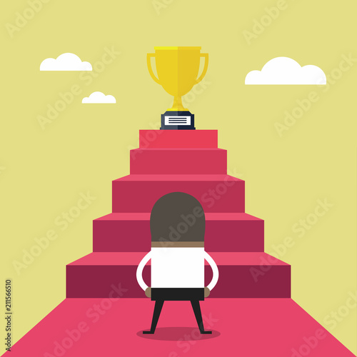 African businessman standing in front of stair that leads the trophy, Shortcut to success.