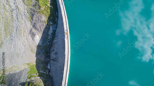 Fotografering Aerial view of the dam of the Lake Barbellino, an Alpine artificial lake