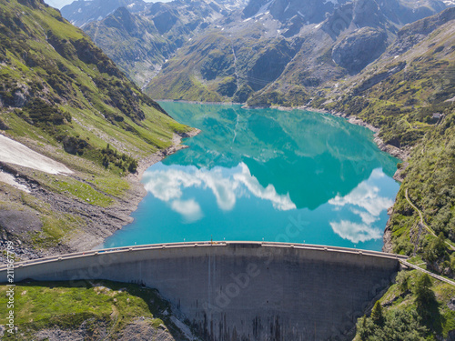 Aerial view of the dam of the Lake Barbellino, an Alpine artificial lake. Italian Alps. Italy photo