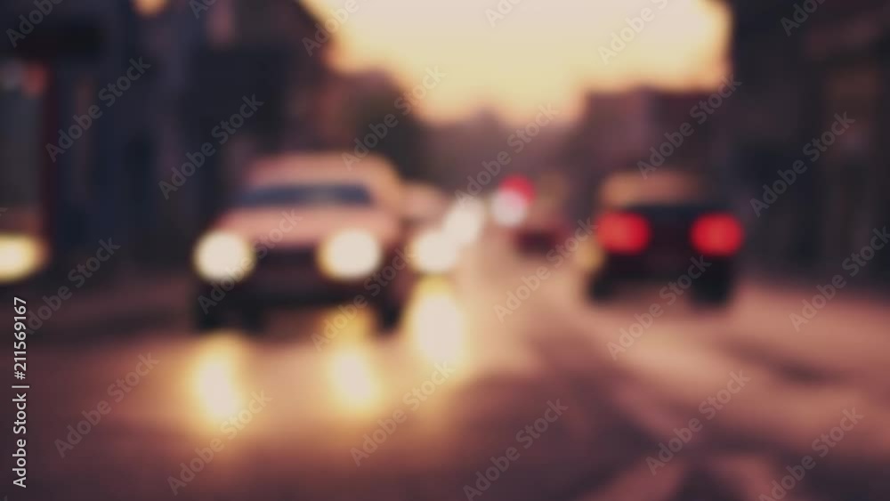 traffic jam through urban street at the end of the working day in the golden sunset traffic jam through urban street at the end of the working day in the golden sunset