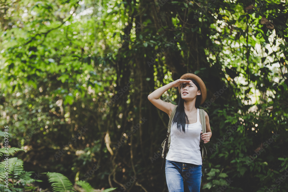 Hiking , Happy female tourist to travel in wild trip hiking during vacation.Travel concept, Hiking at summertime.