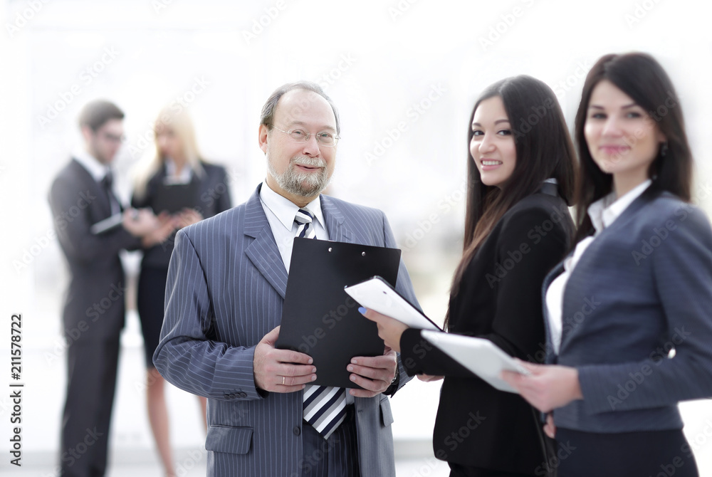boss and employees on blurred background office. boss and employees on blurred background office.