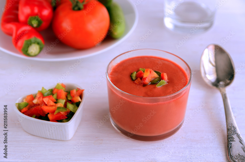 Andalusian gazpacho, Spanish tomato soup made from made of raw blended vegetables and perfect for hot summer. Healthy raw food background Andalusian gazpacho, Spanish tomato soup made from made of raw blended vegetables and perfect for hot summer. Healthy raw food background