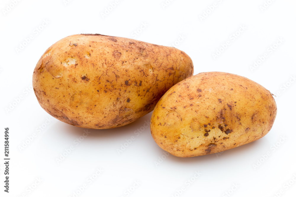 A bio russet potato isolated white background. A bio russet potato isolated white background.