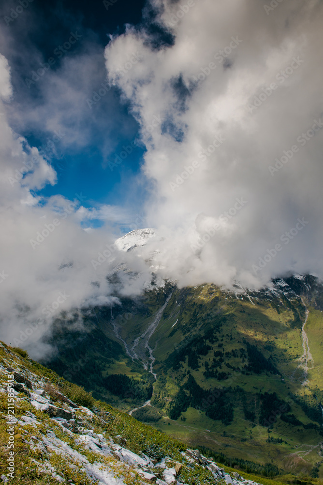 Landscape of the Alps. Snow-capped mountain peaks. beautiful meadows of Austria. Freedom, tourism, travel. Großglockner alpine  road. 
