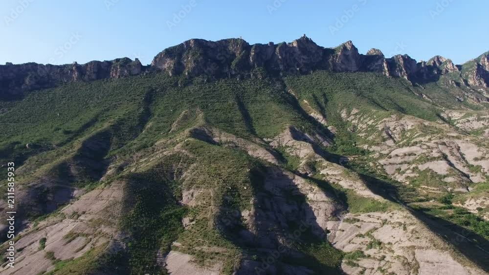 Aerial view of the green mountain with Great Wall in China Aerial view of the green mountain with Great Wall in China