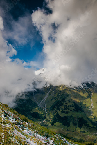 Landscape of the Alps. Snow-capped mountain peaks. beautiful meadows of Austria. Freedom, tourism, travel. Großglockner alpine road. 