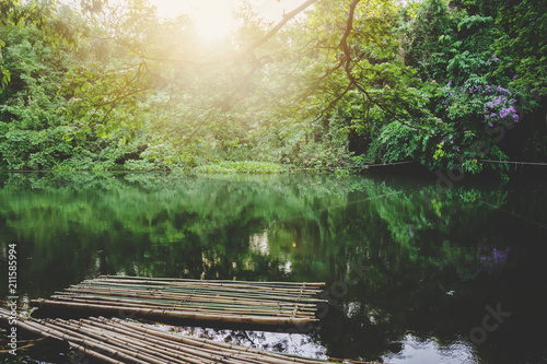 wooden small raft floating on canal. Natural Travel concept photo