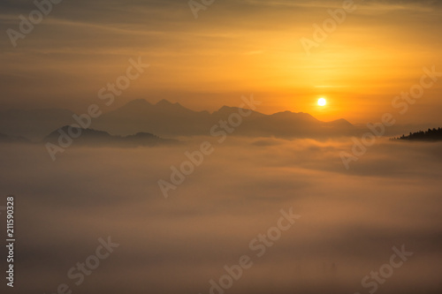 Foggy morning in Alps near Skofja Loka, Slovenia