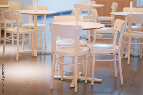 Interior of white table in food court shopping mall. Food center in department store.