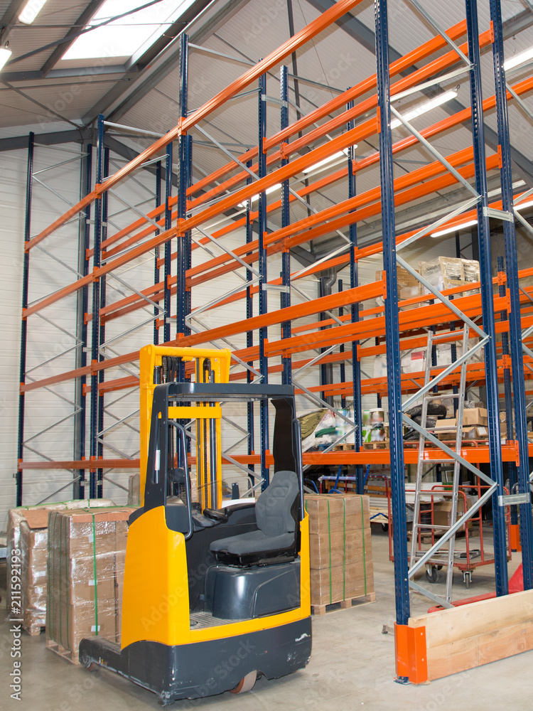 Forklift loading pallet for transport business delivery Shelves in Distribution Warehouse