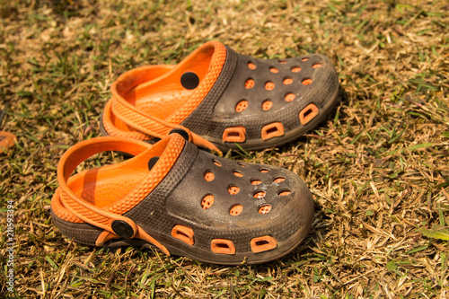 child growing out of his shoes photo