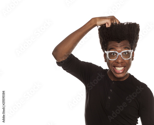 confused young handsome afro american hipster guy  isolated on white background scratching his head. people ideas concept