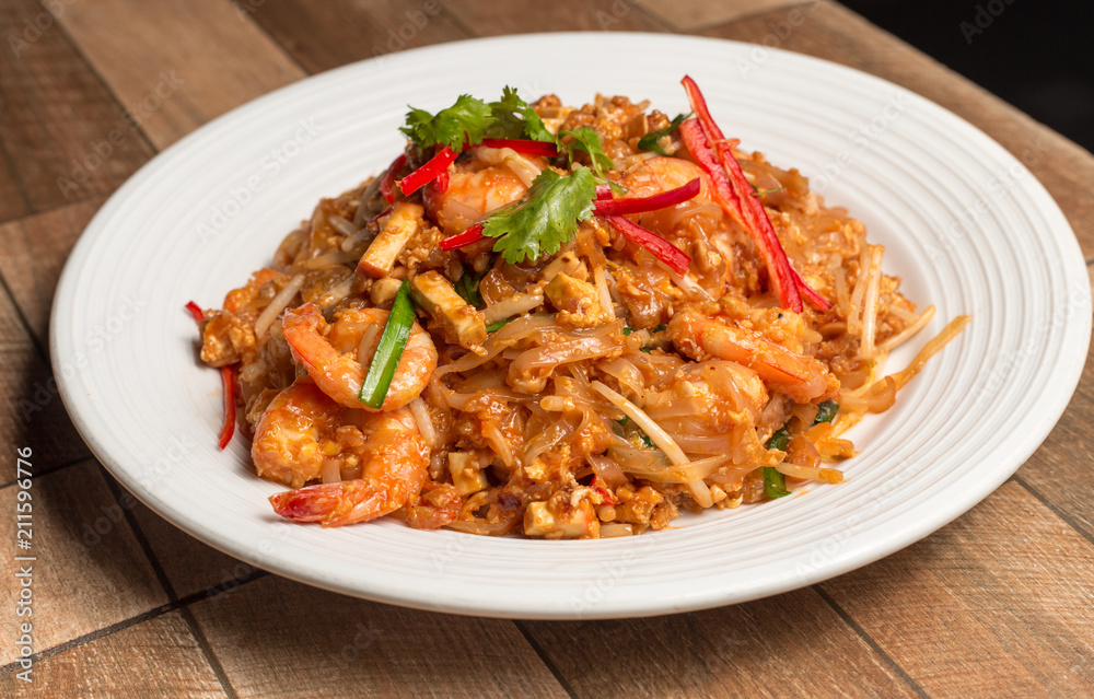 Seafood pad Thai dish of stir fried rice noodles.Thailand's national dishes.