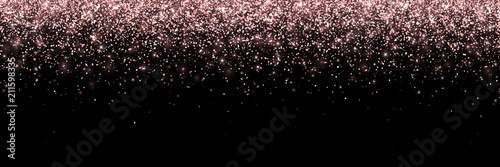 Rose gold falling particles on black background, wide banner. Vector