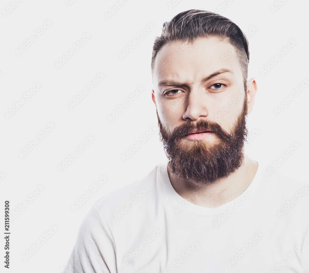 Young bearded man over white background. Lifestyle and people concept. Young bearded man over white background. Lifestyle and people concept.