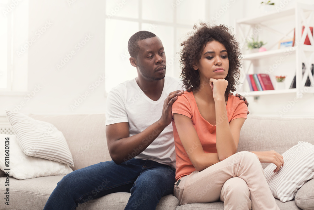Young black couple quarreling at home Young black couple quarreling at home