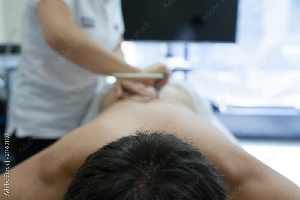 physiotherapist applying massage physiotherapist applying massage