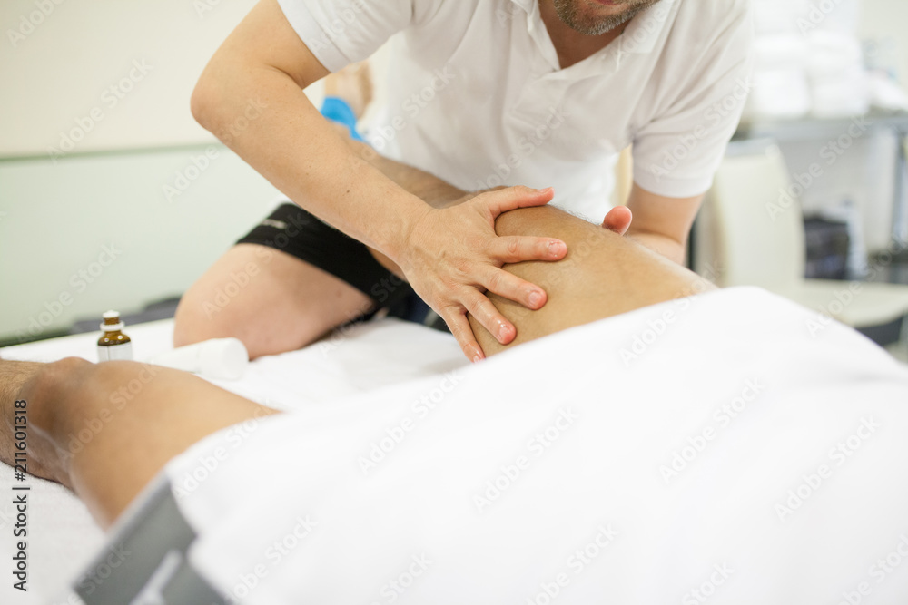 physiotherapist applying massage physiotherapist applying massage