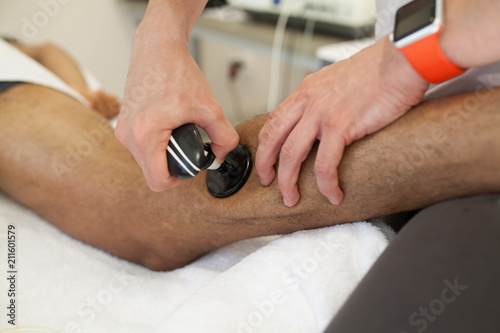 physiotherapist applying massage