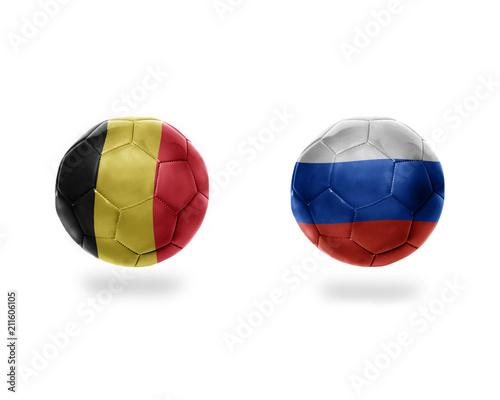 football balls with national flags of belgium and russia.