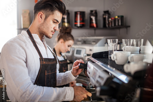 Barista team at work, coffee shop business concept