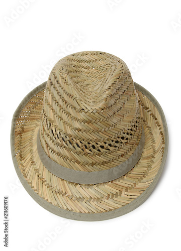Old straw hat on a white background photo
