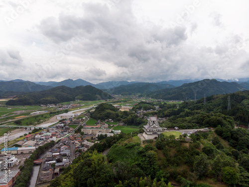 Kawahara Castle in Tottori Prefecture in secure position overlooking small town