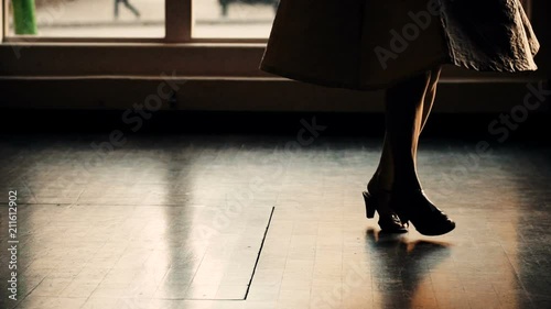 Female Dancer's Feet in Character Shoes (Pink Background)