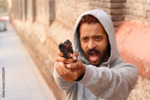 man holding a gun 