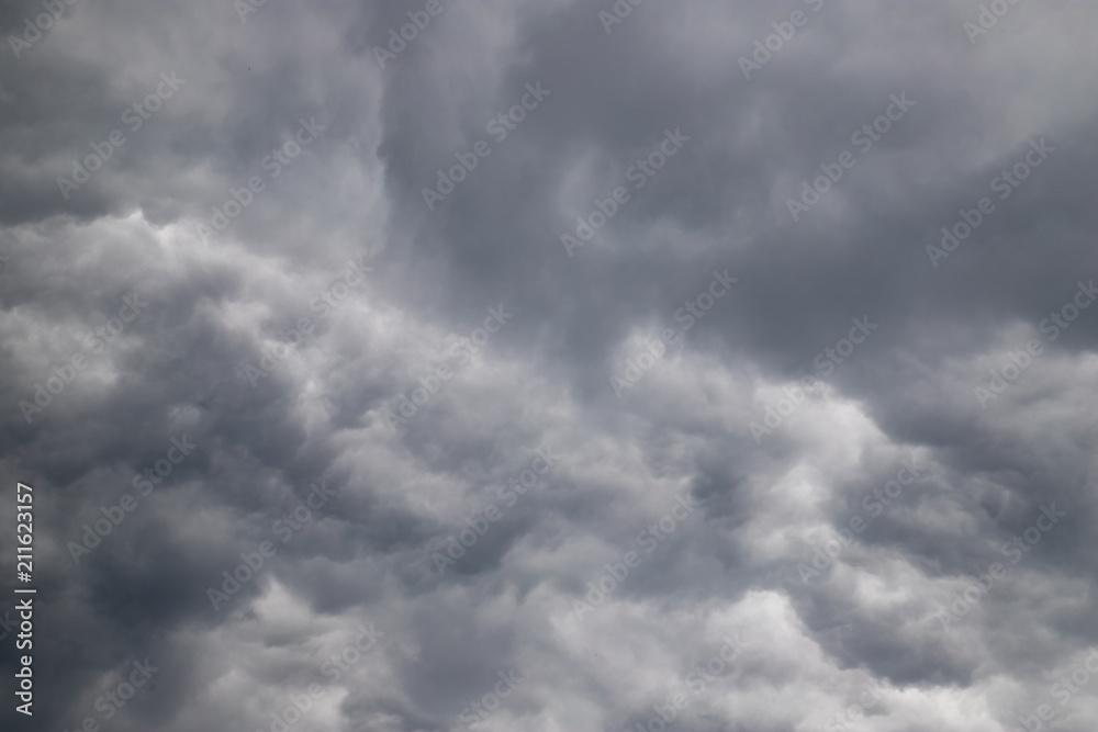 grey clouds against a grey sky.
