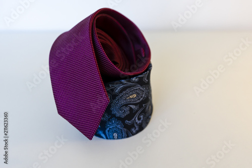 Two ties stacked on each other