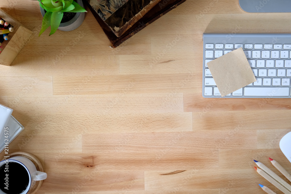 Wooden desk with computer and office supplies. Wooden desk with computer and office supplies.