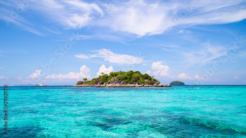 The island is located in the sea The sea is clear and can see the coral. And beautiful sky : Koh Lipe, Satun Province, Thailand photo