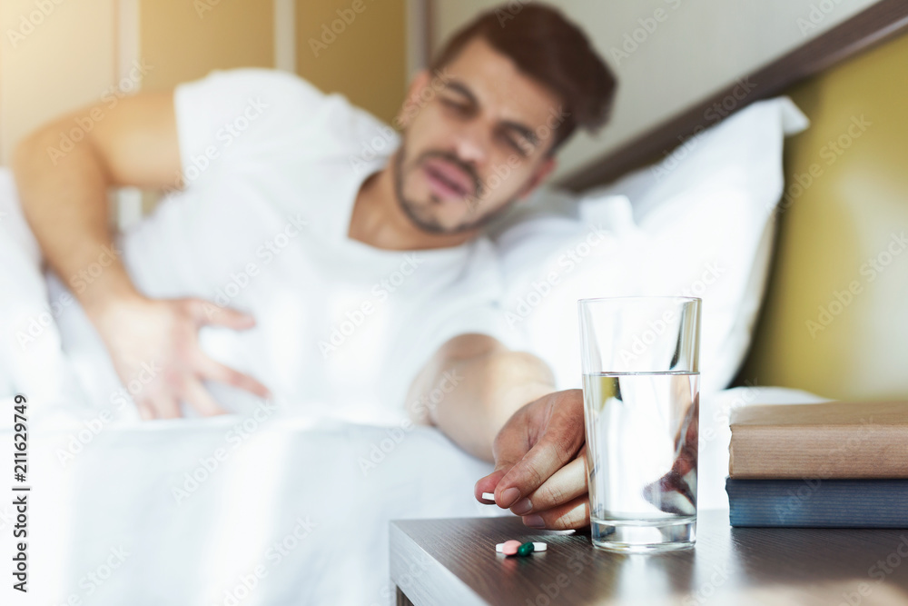 Man wake up with pain and trying to get pills Man wake up with pain and trying to get pills