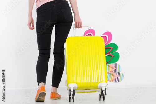 girl with suitcase isolated on white background Fototapeta