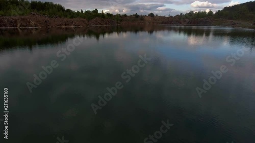 Beautiful view from a road going through the beautiful lake and forest