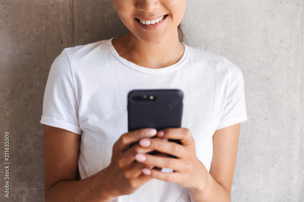 Cropped image of a smiling young asian woman Cropped image of a smiling young asian woman