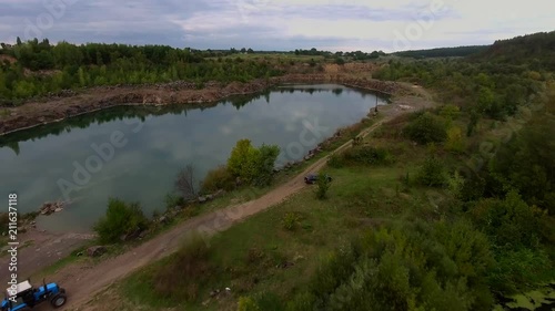 Beautiful view from a road going through the beautiful lake and forest