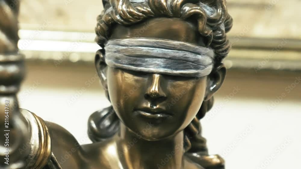 Themis bronze statue face close up Themis bronze statue face close up