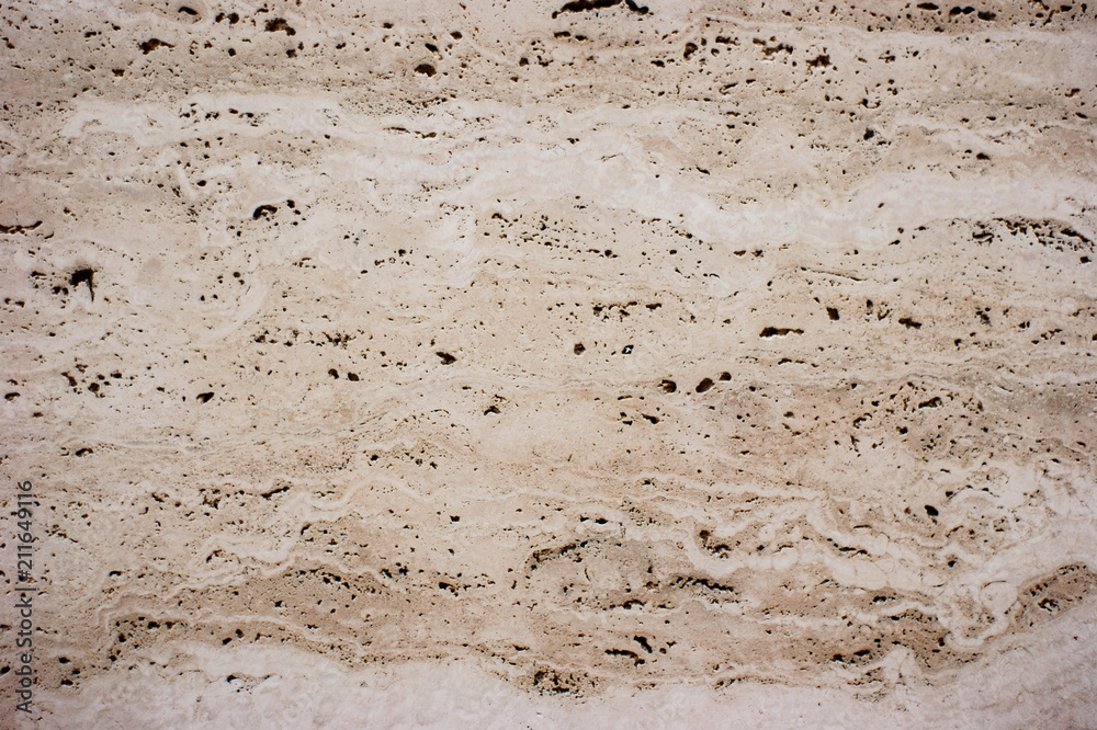 Stone surface of a dark yellow sandstone - background, texture Stone surface of a dark yellow sandstone - background, texture