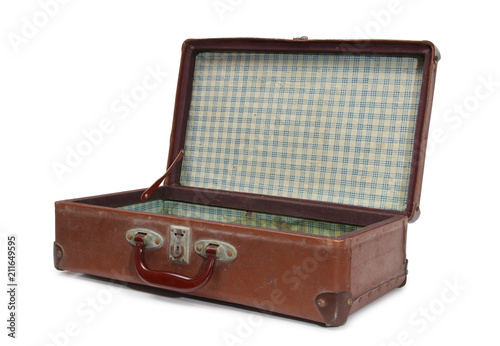 Ancient suitcase for travel on a white background