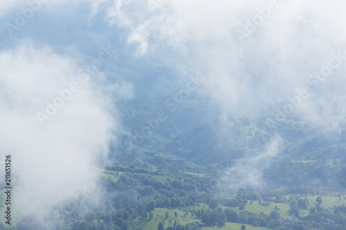 Summer scenery in the mountains, with rain and mist clouds