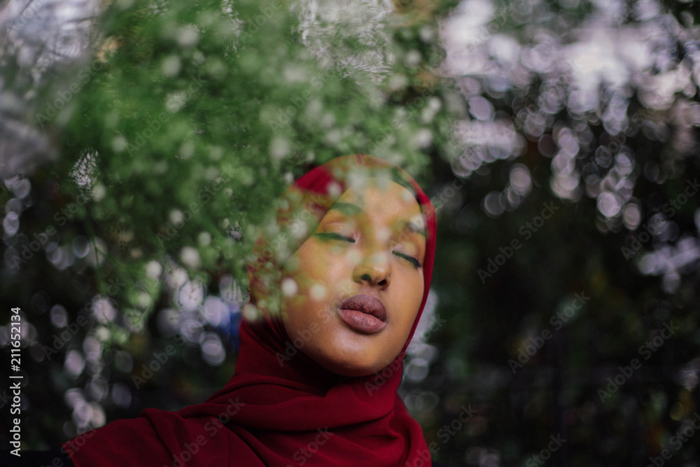 Girl in hijab under tree Girl in hijab under tree
