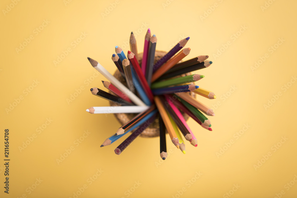 Top view Crayon Pencil on Yellow Background. Copy Space. Top view Crayon Pencil on Yellow Background. Copy Space.