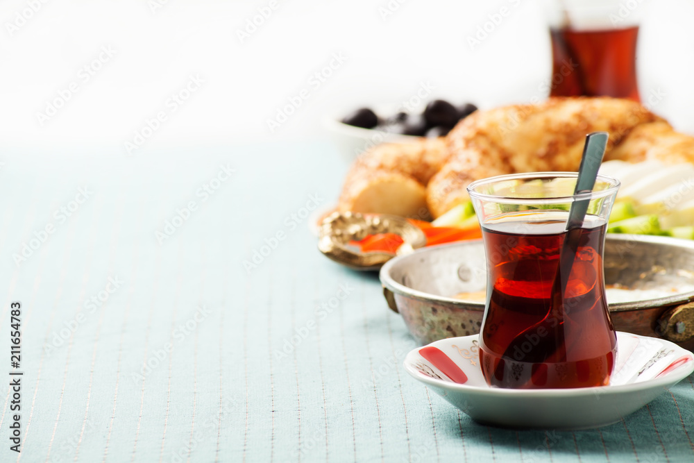 Fototapeta premium Traditional Turkish breakfast with fried eggs and tea