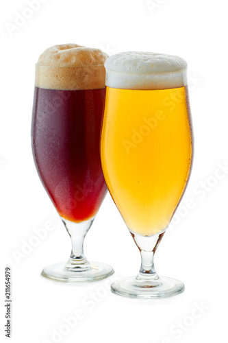 Two glasses of pale amber and dark beer photo