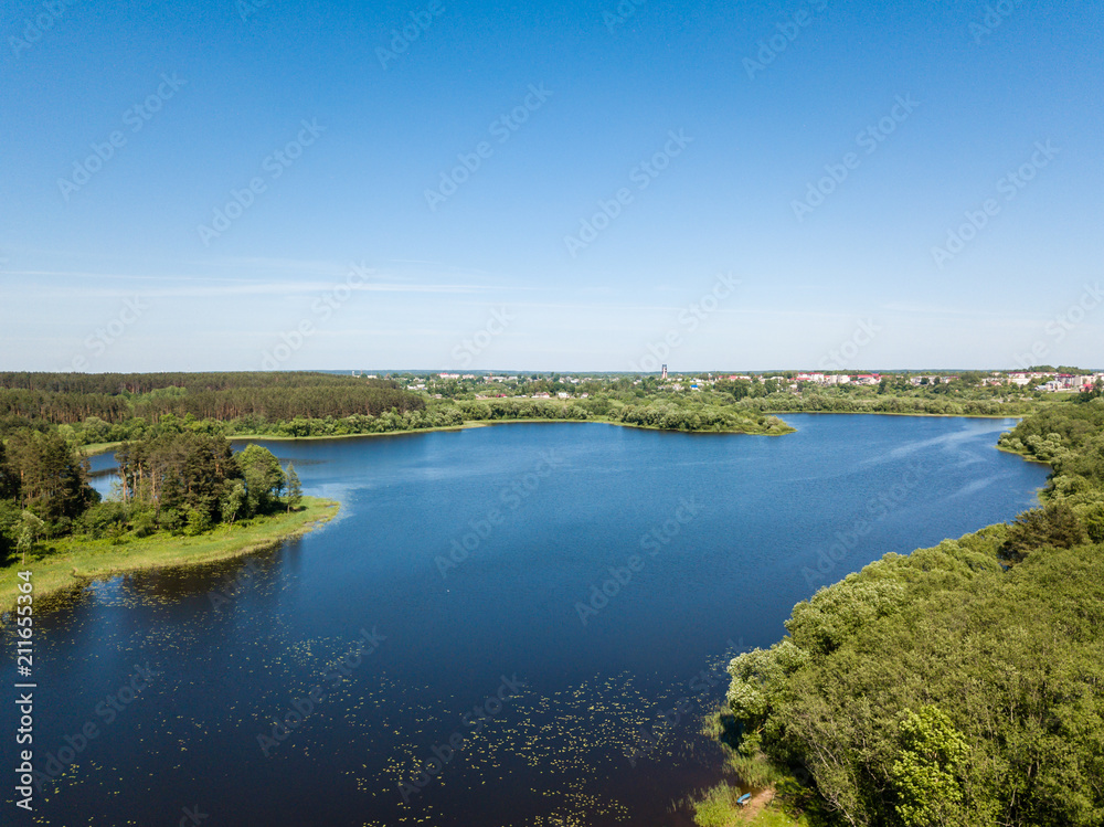 Beautiful aerial view of lake and forest district. Belarus is th